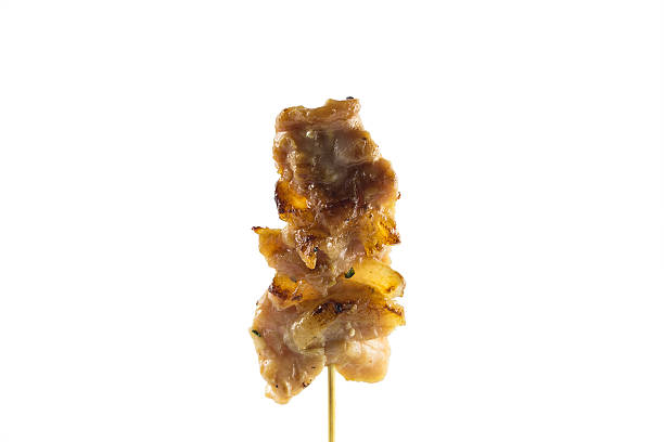 istock Grilled pork skewers isolated on white background with clipping 517013776
