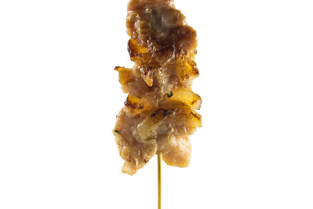 istock Grilled pork skewers isolated on white background with clipping 517013888