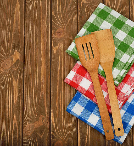 istock Wooden spoon and napkin 517014141