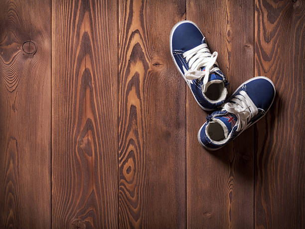 istock Two sneakers on the floor 517014142