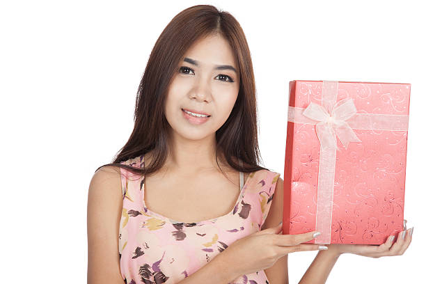 istock Beautiful Asian girl with red gift box 517014807