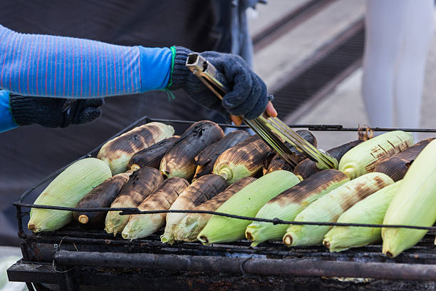 istock Grilled sweet corn on the charcoal stove.sensitive focus 517015282