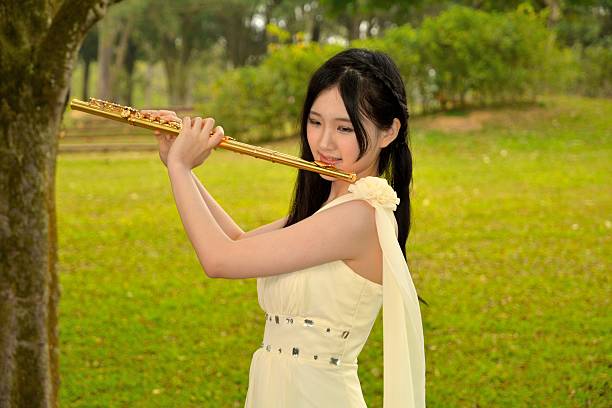 istock Girl practiced the flute 517016441