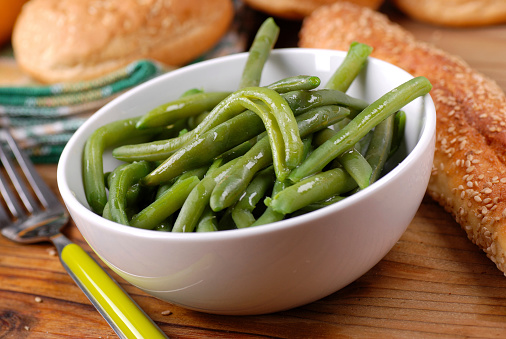 salad of green beans in white bowl