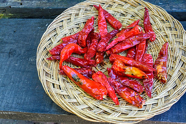 istock dried chili peppers on  wooden table 517019635