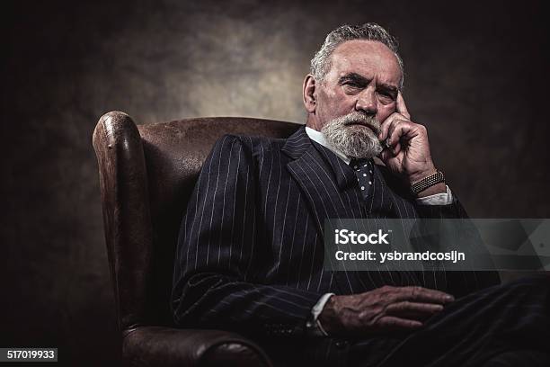 In Chair Sitting Characteristic Senior Business Man Gray Hair Stock Photo - Download Image Now