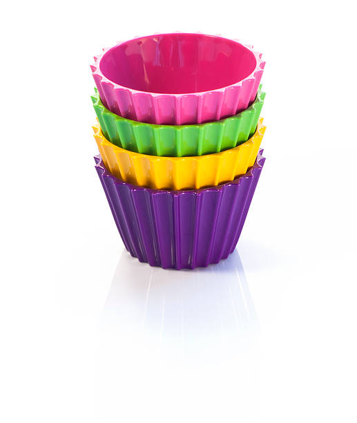 istock Four colorful cups on white background 517041535