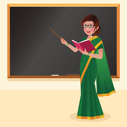 Indian Teacher With Reading Glasses In Front Of Blackboard Stock  Illustration - Download Image Now - iStock