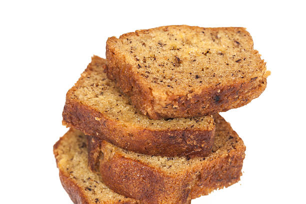 istock Homemade banana bread sliced on white background 517044382