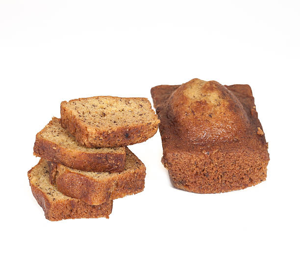 istock Homemade banana bread sliced on white background 517044706