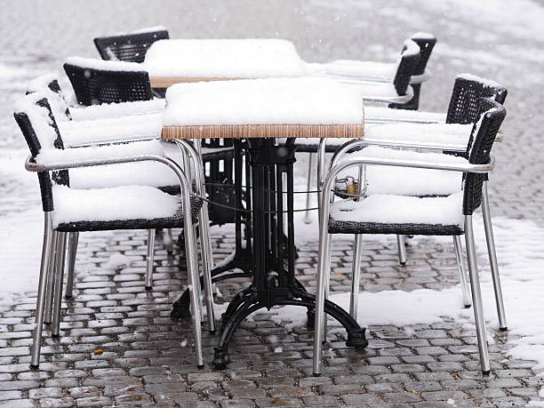 istock snowy chairs tables winter 517045223