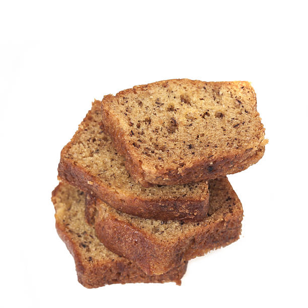 istock Homemade banana bread sliced on white background 517045268