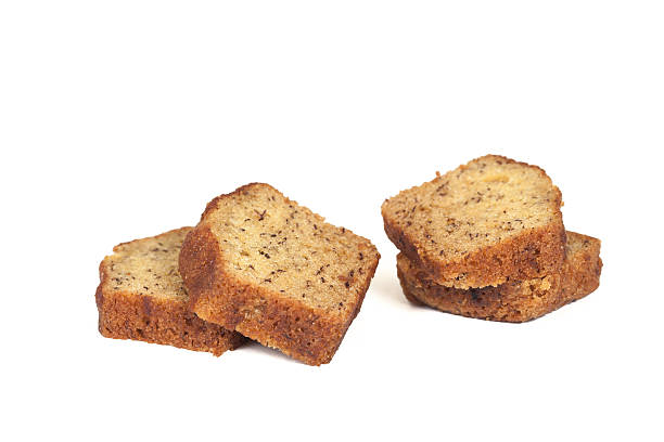 istock Homemade banana bread sliced on white background 517046050