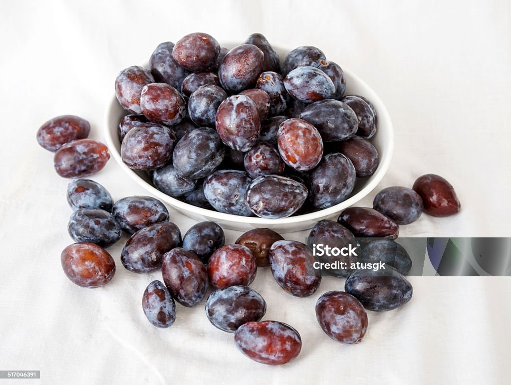 Damson plum in a white plate Agriculture Stock Photo