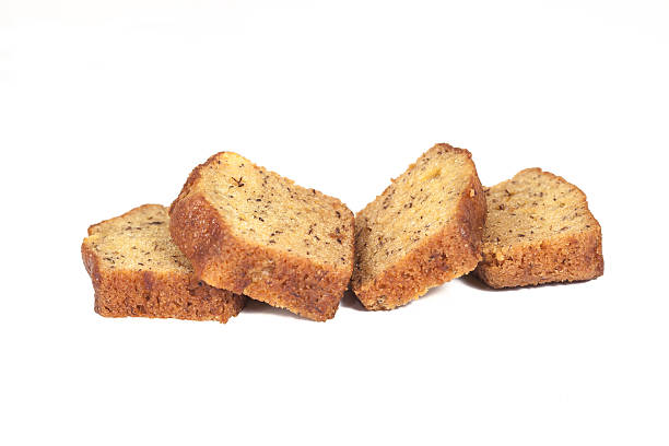 istock Homemade banana bread sliced on white background 517046524