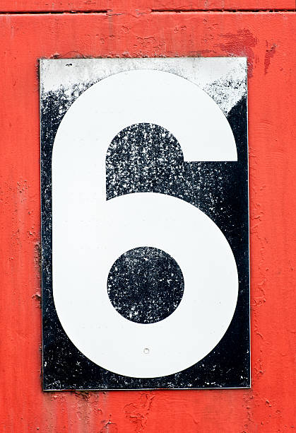 istock Number six in black over red 517047188