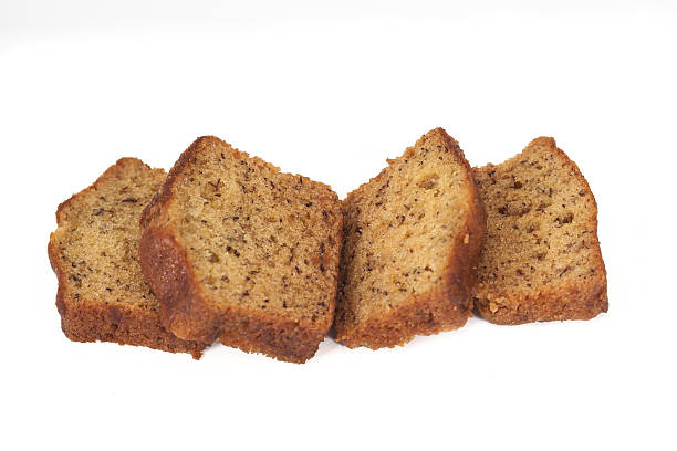 istock Homemade banana bread sliced on white background 517047238