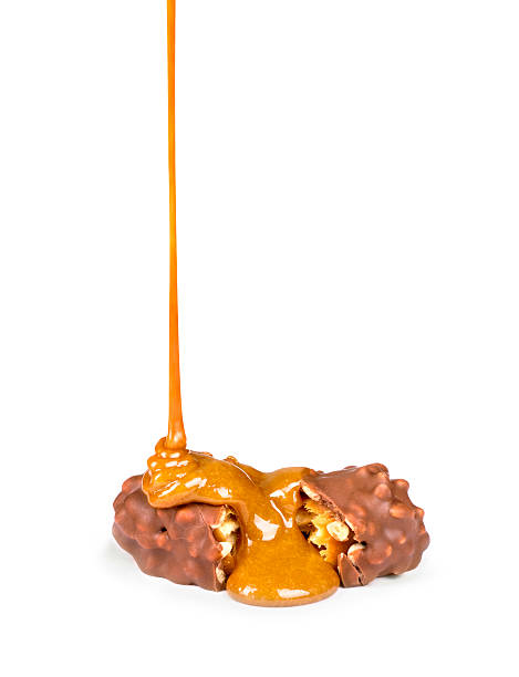 istock sweet caramel sauce is poured 517047676