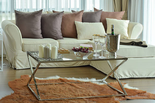 istock candles and wine glasses on the table with beige sofa 517049656