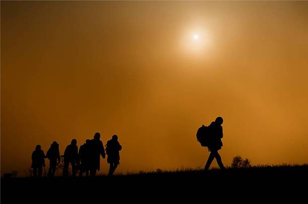 istock Emigrants leaving their country in sunset 517050100