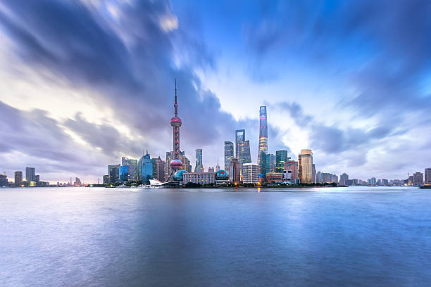 istock Shanghai Skyline and Cityscape at Sunrise with Dramatic Clouds 517050344
