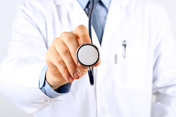 Doctor with stethoscope stock photo