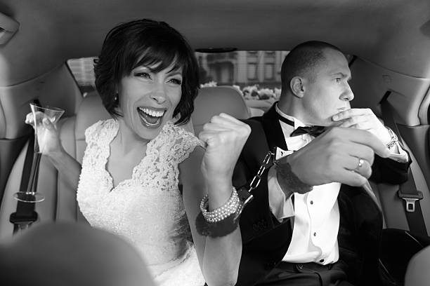 Bride celebrating her marriage with champagne