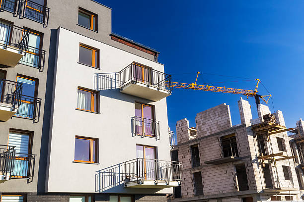 istock New complex of apartment buildings under construction 517053046