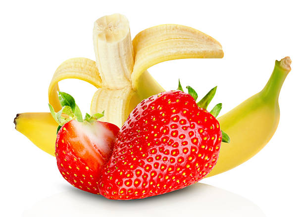 istock bananas and strawberries isolated on the white background 517054353
