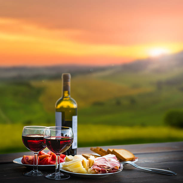 istock still life Red wine  ,cheese and prosciutto 517055146