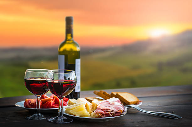 istock still life Red wine  ,cheese and prosciutto 517055158