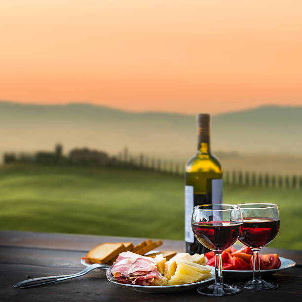 istock still life Red wine  ,cheese and prosciutto 517055172