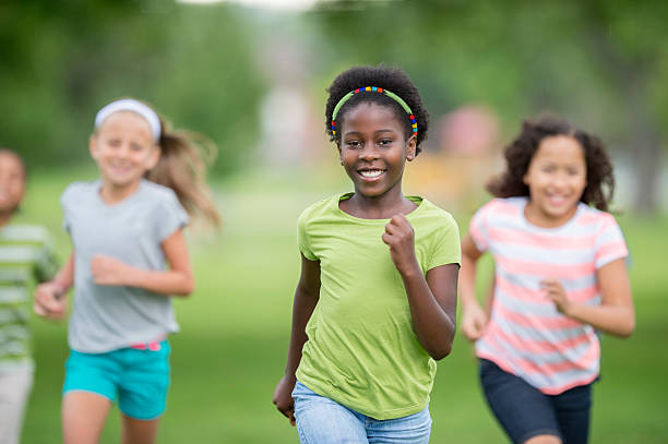 istock Running Happily Through the Park 517055266