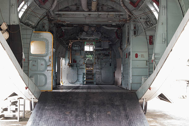 Cargo compartment of military transport Cargo compartment of military transport jet logistical stock pictures, royalty-free photos & images