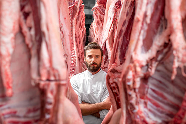 istock Butcher at the meat manufacturing 517056260