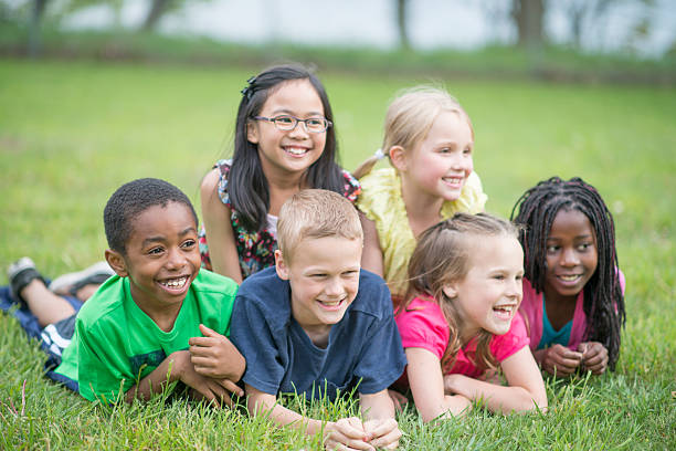 istock Children Relaxing at the Park 517057322