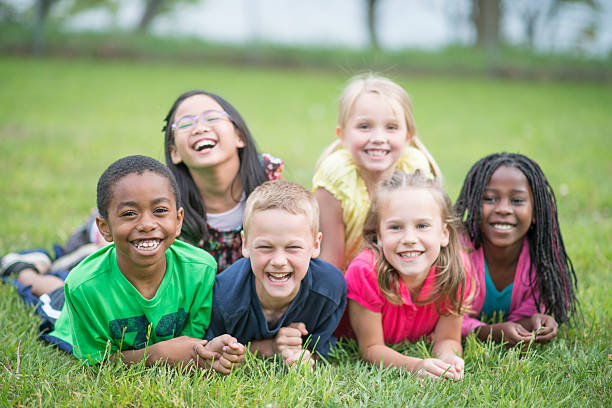 istock Children Laughing Together 517057392