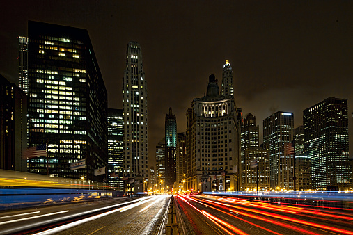 In the heart of Chicago, night traffic crossing the DuSable Bridge.  Facing south Michigan Avenue.