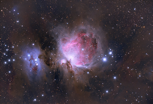 Orion Nebula (also known as Messier 42, M42) in Orion constellation with extra star spikes. Picture taken with professional CCD camera and refractor-telescope (520mm, f/6,5), total exposure time: 150 minutes.