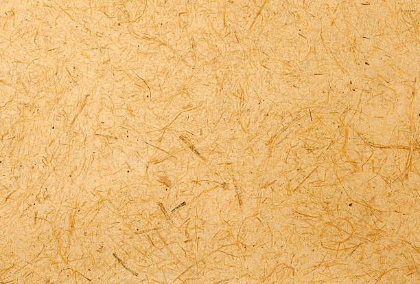 istock Yellow natural texture paper background 517076560