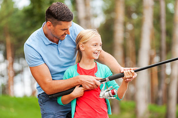 istock Fishing together is fun. 517077557