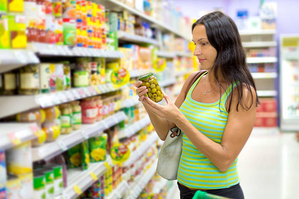 istock woman chooses olives 517077665