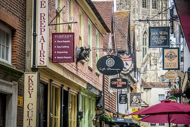 Canterbury, Kent, UK - June 28, 2015: - View of the various shop signs in Butchery Lane, Canterbury