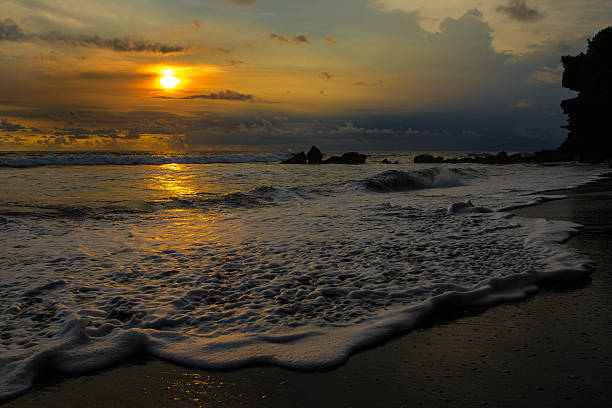 istock Sunset at Tanah Lot Beach, Bali, Indonesia 517078422