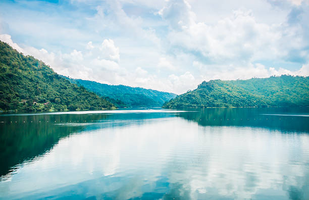 istock clouds and blue sky with Mountain and Lake 517079429