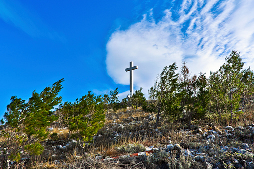 Cross on the Mountain in Mostar during a Windy Day, Bosnia and Herzegovina.