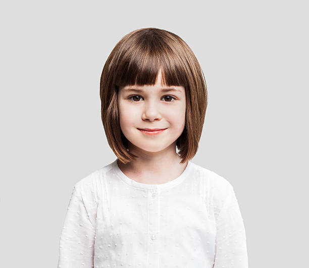 Little Girls 6 7 Years Brown Hair Human Face Stock Photos, Pictures &  Royalty-Free Images - iStock