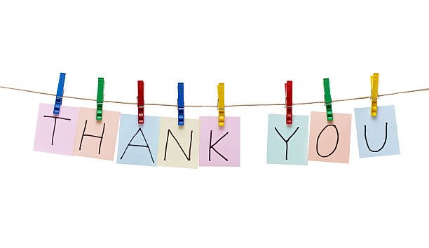 istock clothes peg and note paper on clothes line rope 517082156