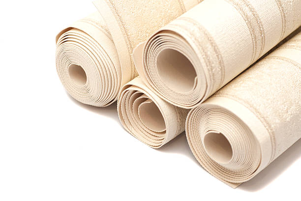 istock Roll of vinyl wallpapers on white background 517082164