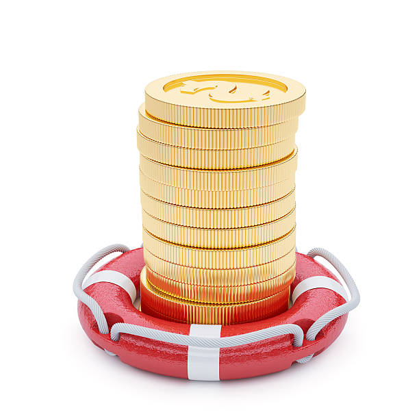 istock Stack of coins with lifebuoy 517082990
